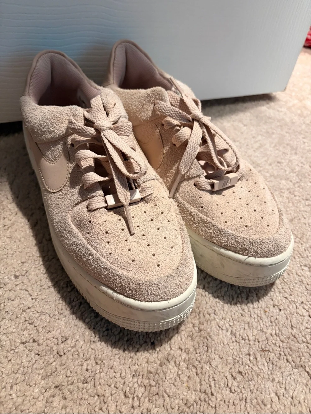 Nike Women’s Light Pink Suede Platform Sneakers